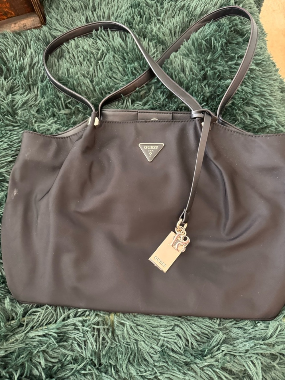 Guess Black purse with Gold Logo Charm